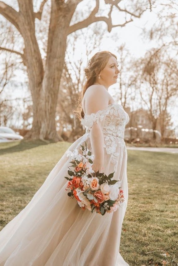 Woman with wedding flowers